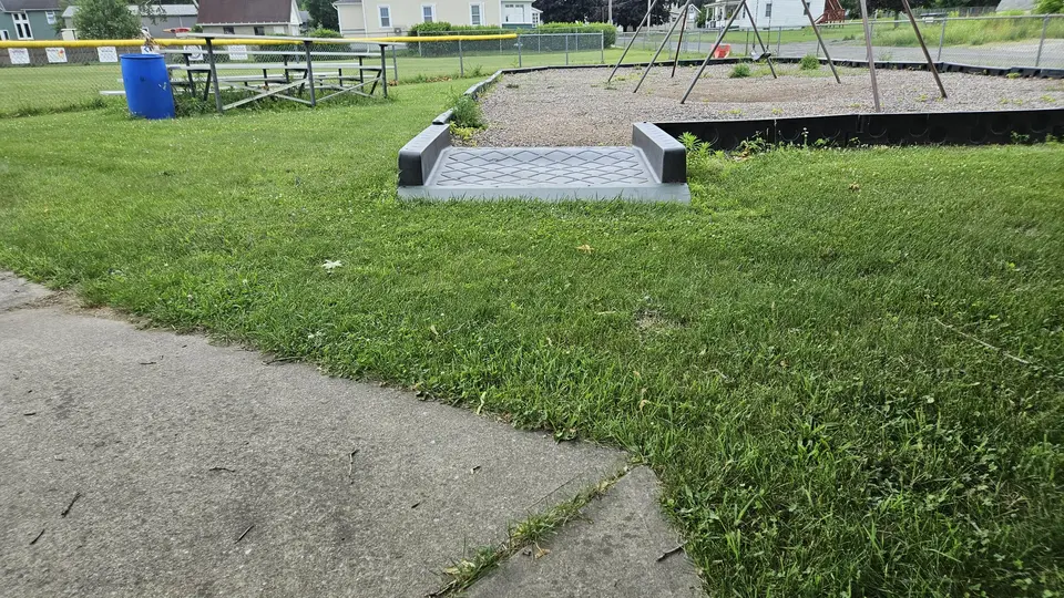 A ramp into the swingsets.