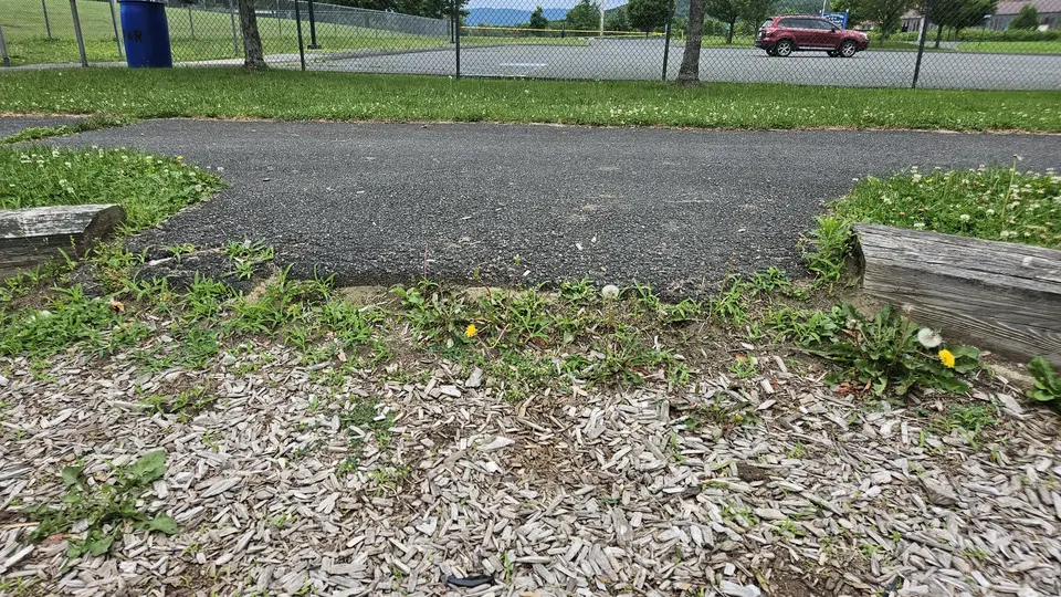 The 1' gap to enter the playground.