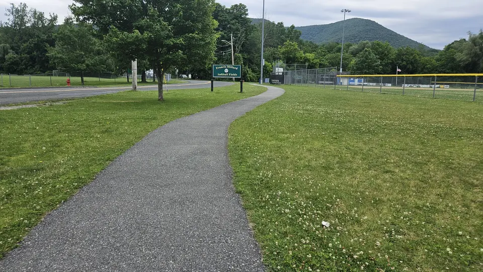 A section of the paved path that goes around the fields.