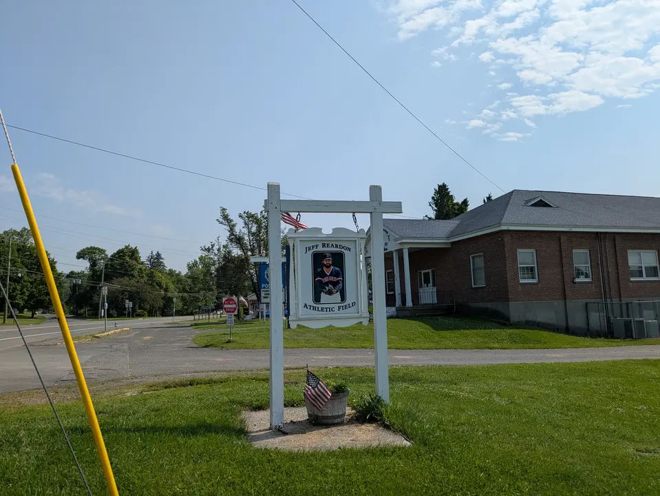 Entrance Sign to the park seen from North St
