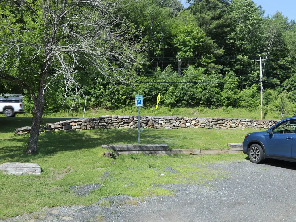 An accessible parking space which sits closest to access to Route 20.