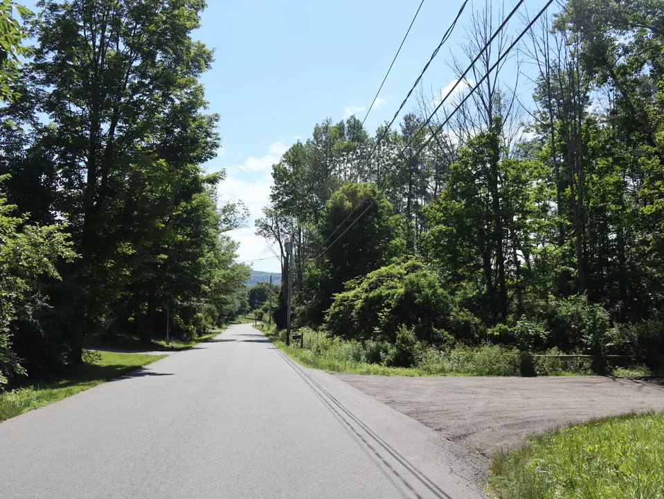 The trailhead for Golden Hill Forest (right) as seen from Golden Hill Road.