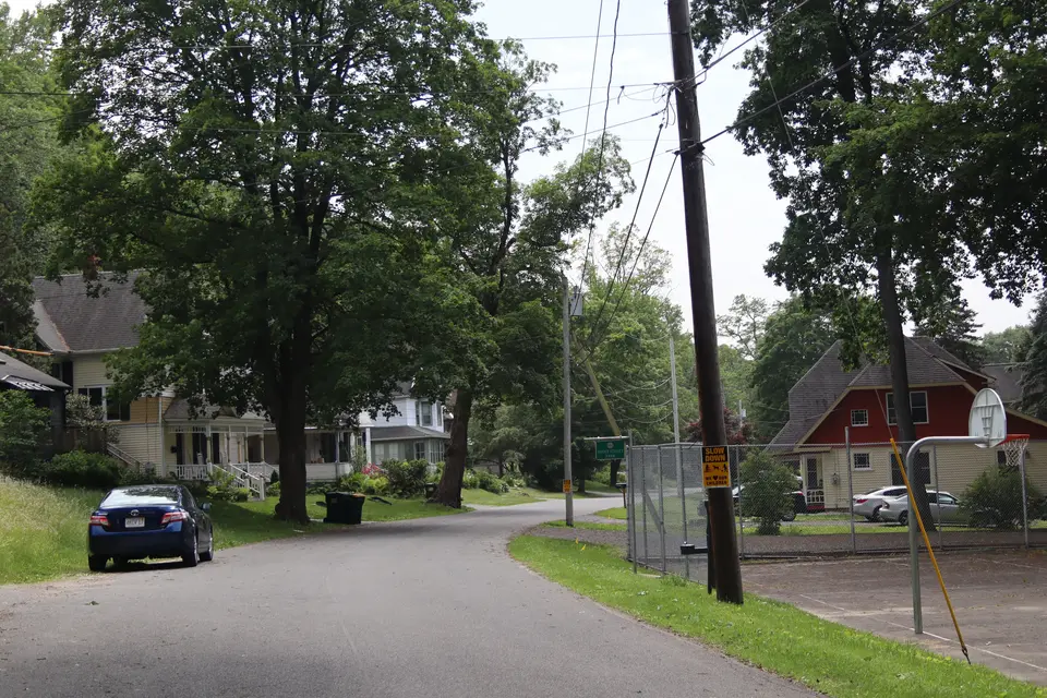 Grove Street Park (right) from Grove Street. Parking is avaliable on road or in a small gravel lot.