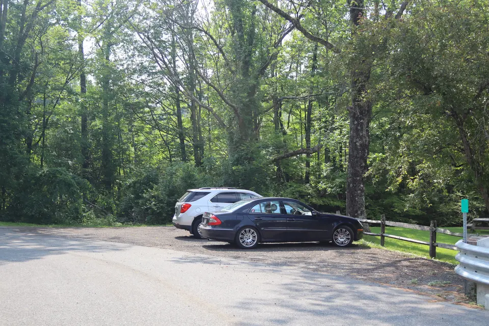 Parking area for Interlaken park, at the intersection of Interlaken Road and Averic Road.