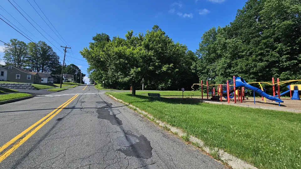 The street by the playground.