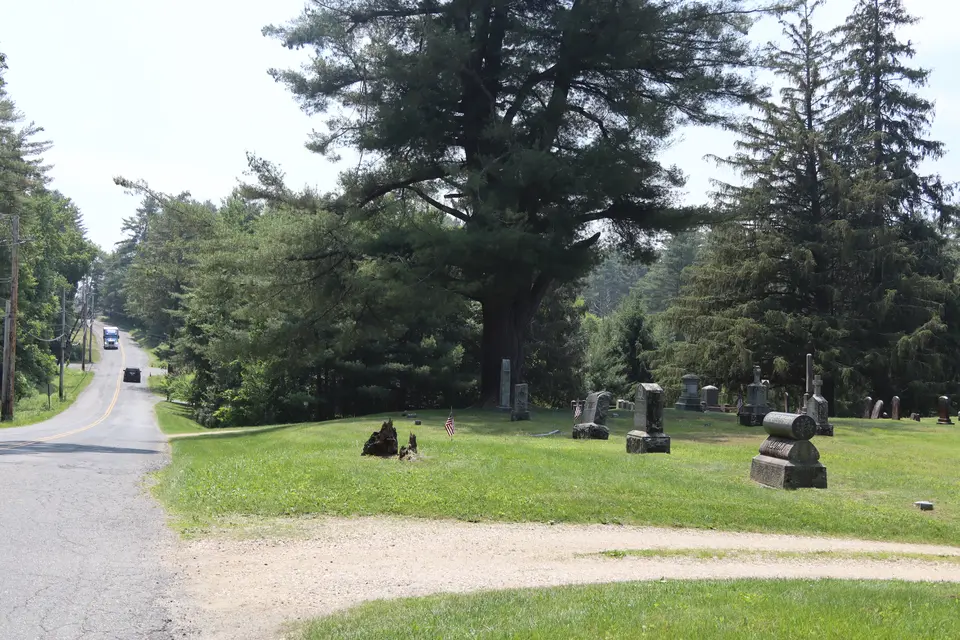Entrance to the Mill River Cemetery (right) off Mill River-Southfield Road.