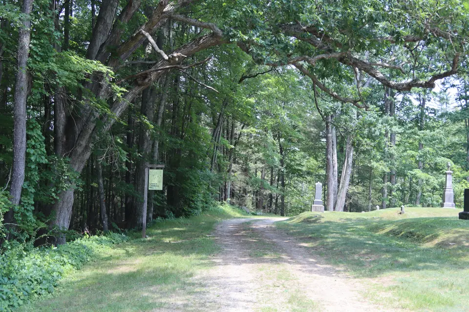 Entrance to the Lower Caroll Mill trail at the far end of the Mill River Cemetery.