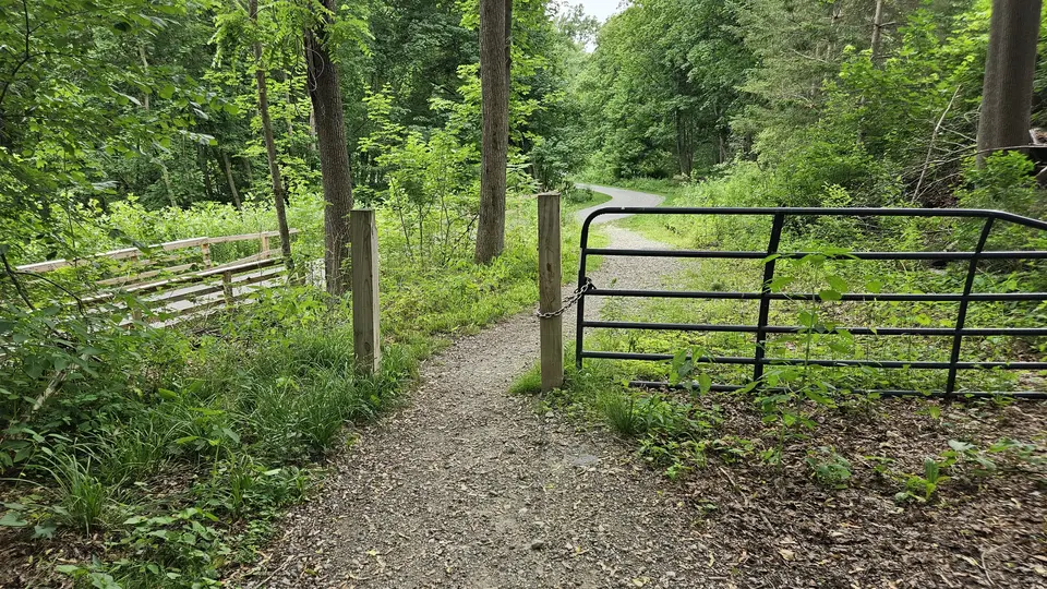 The gate to enter the path from the parking lot.