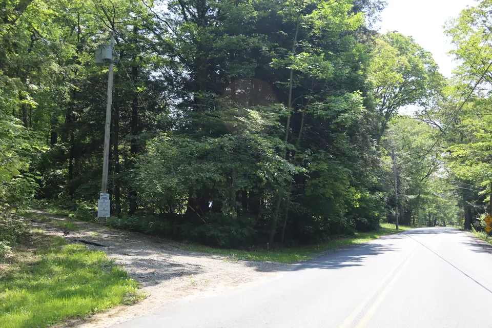 Mount Darby access road (left) as seen from East Street in Mount Washington