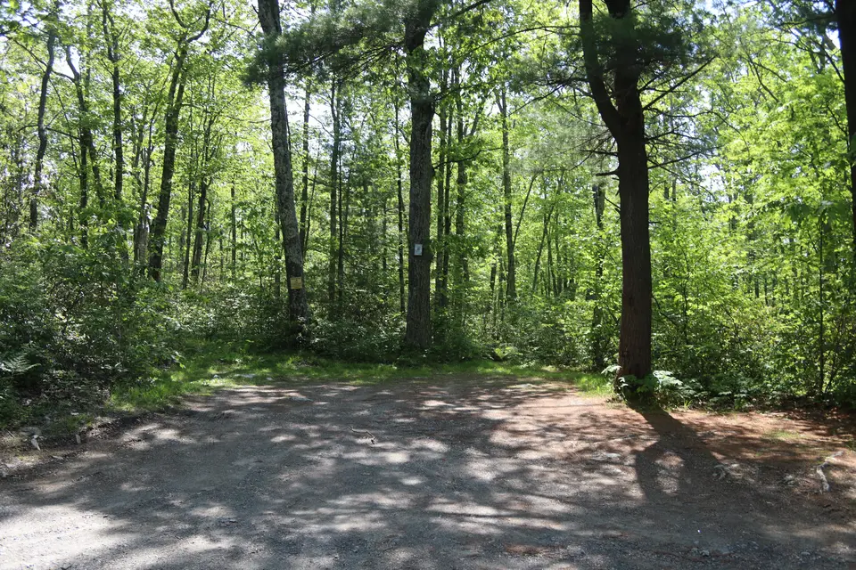 Parking lot across Mount Washington Road from the trailhead, with space for roughly 4 cars.
