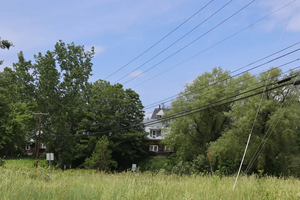 View of New Marlboro through a field from the Preserve.