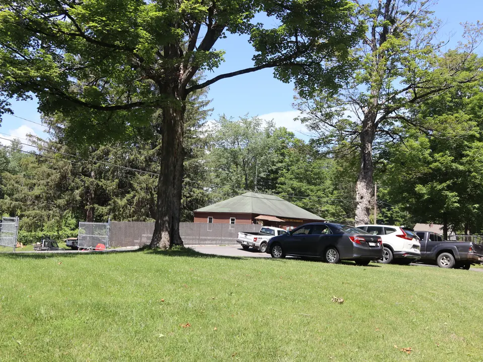 Additional grass parking in front of the October Mountain State Forest office.