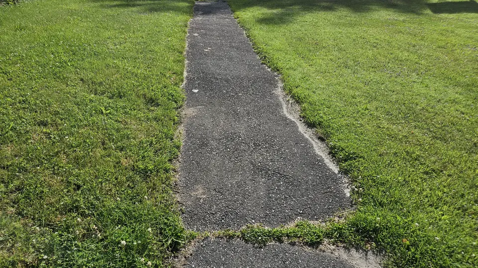 A section of the paved path around the park.