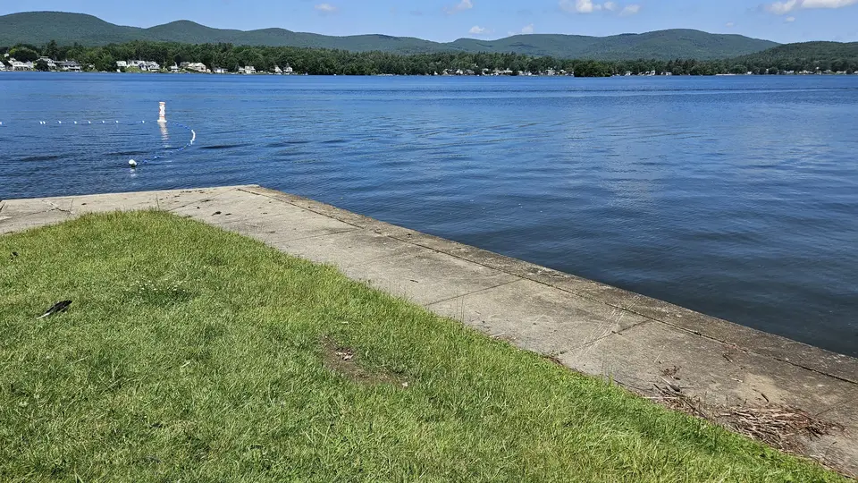 The paved area by the water