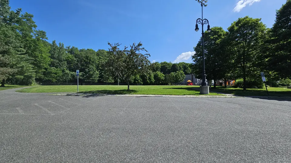 The parking lot, with handicap spot on the left.