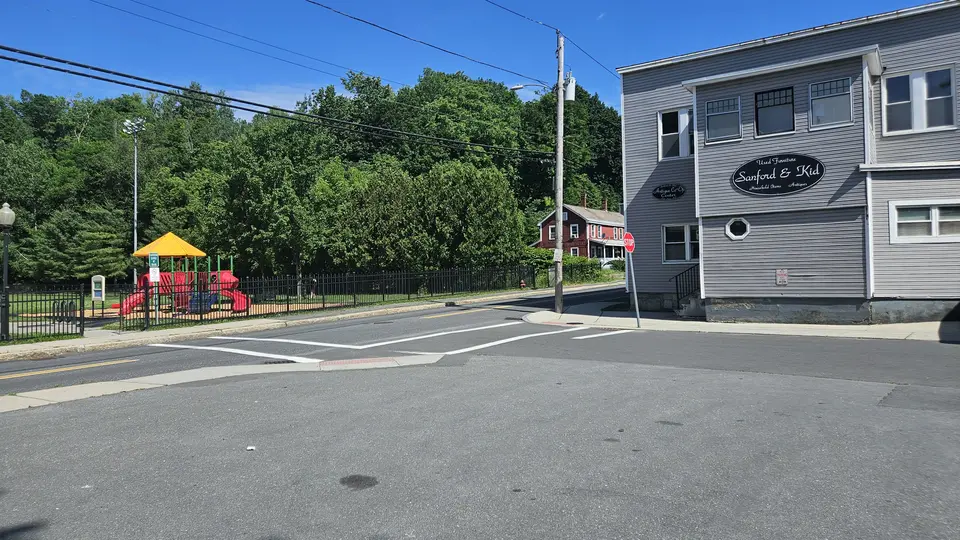 The entrance to the parking lot.