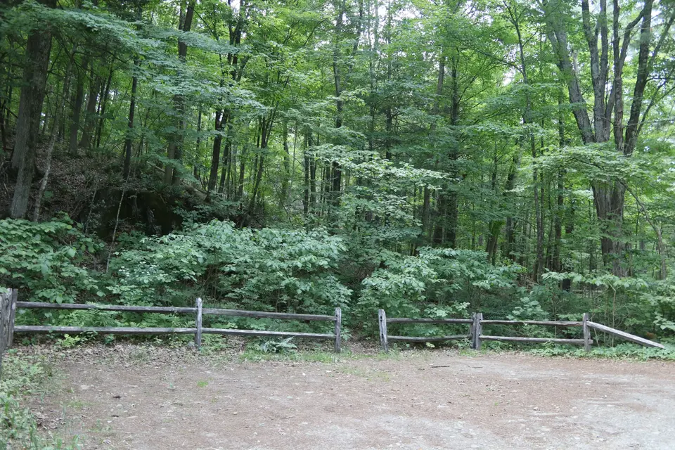 Dirt parking area for the Drury Preserve.