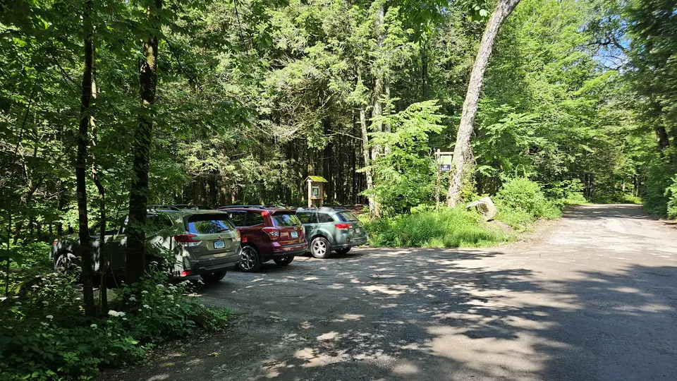 The parking lot, made of hardened dirt