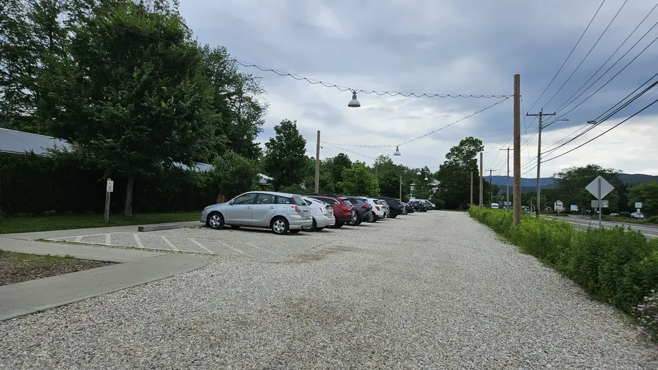 The parking lot, showing designated handicap spots.
