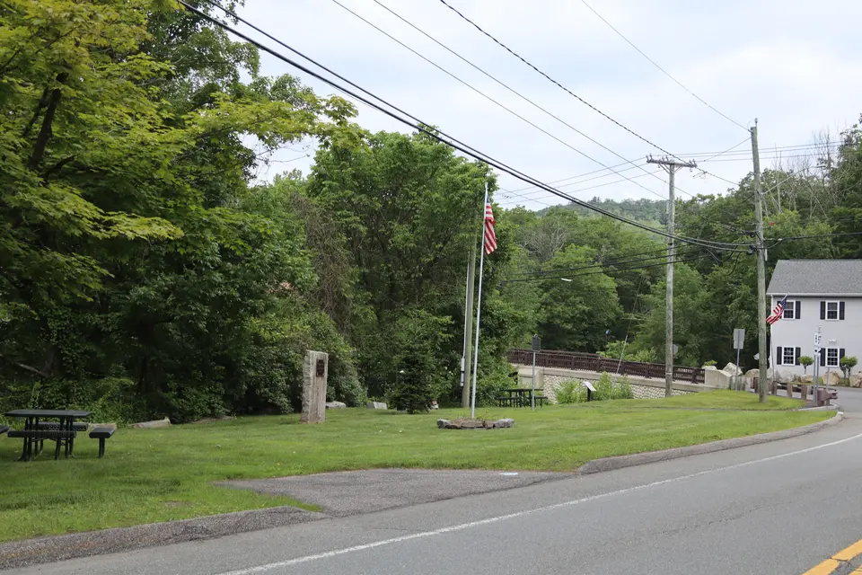 Wilber park as seen from Massachusetts Route 8. A small parking space can be shown, with another additional parking area just before the bridge.