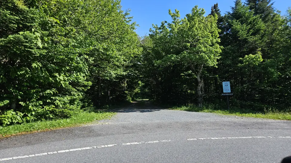 The entrance to the parking lot.