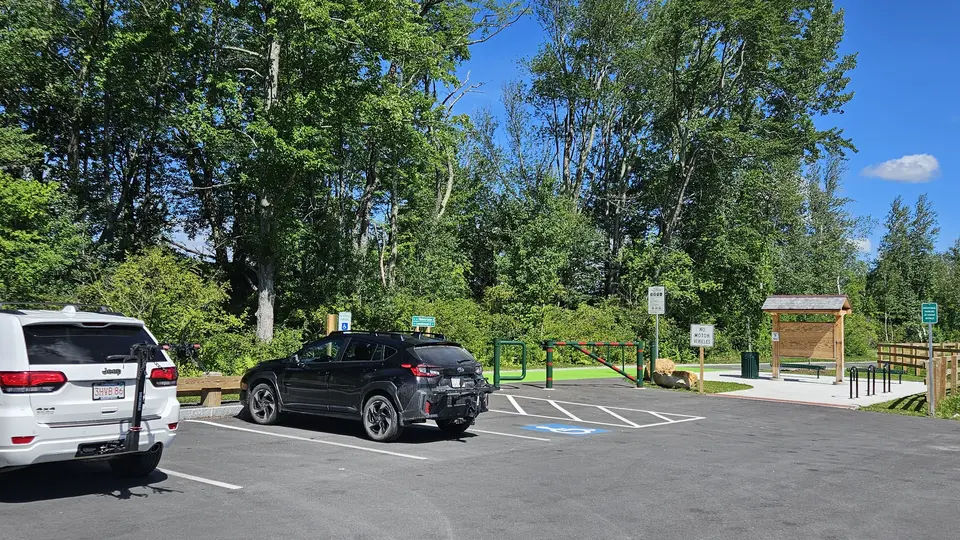 A handicap parking spot in the paved parking lot.