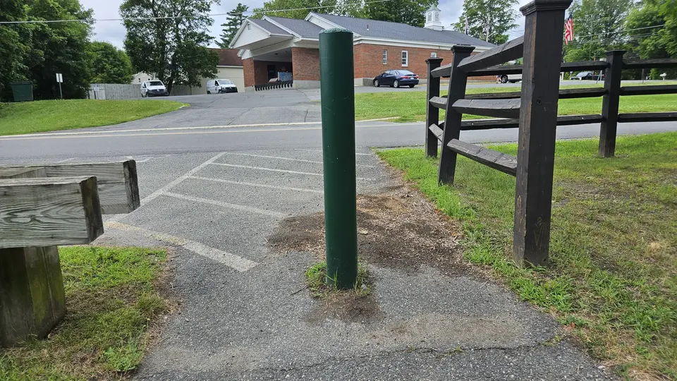 The large gaps between the bollards and fence, to reach the Ashuwilticook from the parking lot.