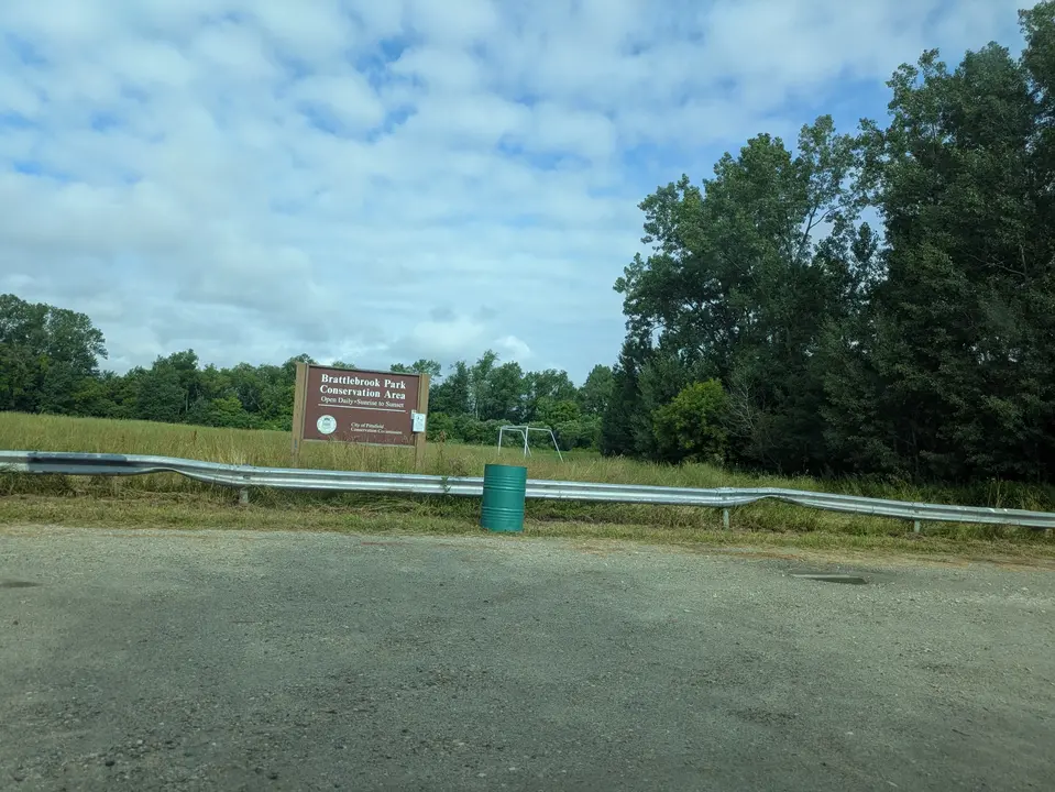 Entrance sign and parking area