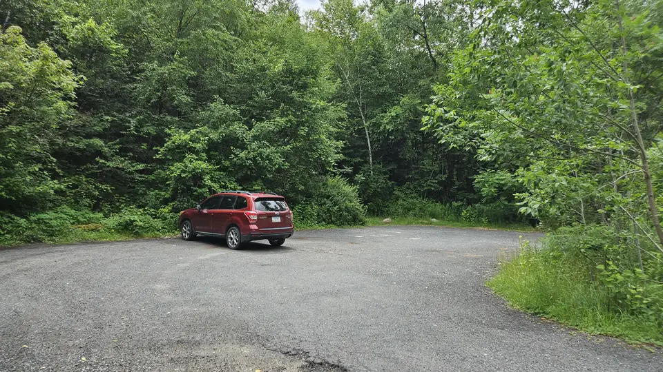 The flat paved parking area.