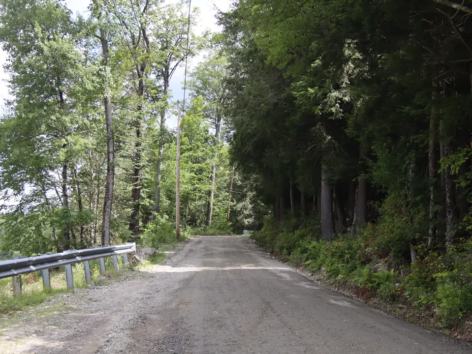 Entrance to the Clam Lake Flood Control Site (left), from Hammertown Road.
