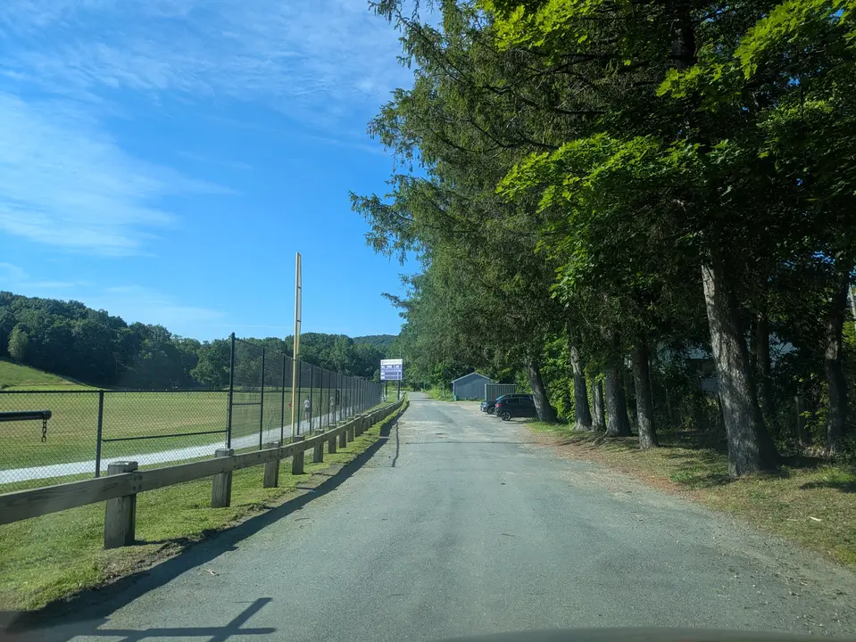 Entrance road leading to the parking areas