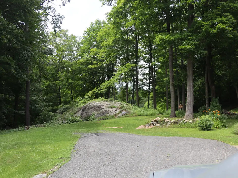Small, gravel parking area on Cliffwood Street, which offers an entrance to the Ferncliff Reservation.