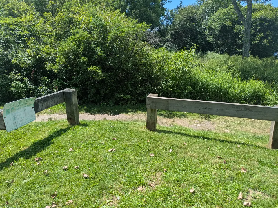 Entrance to grass field from Lakeway Drive
