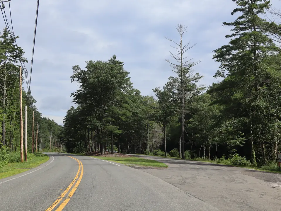 Entrance to the Farmington River Trail parking area (right) from Massachusetts 8 North.