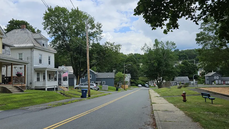 The road that runs by the park.