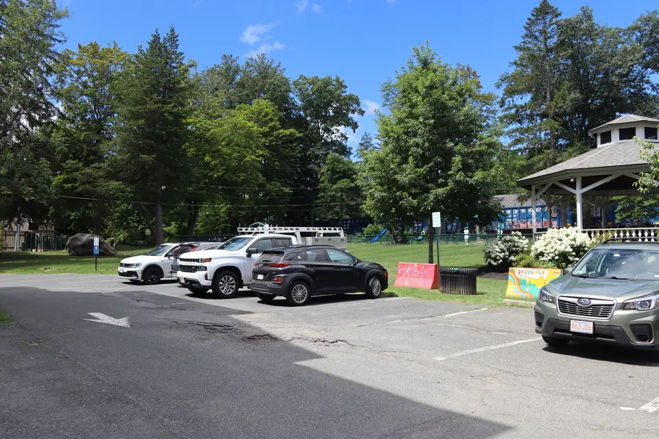 Parking area directly adjacent to Giggle Park. Spots are reserved for employees only during select hours.