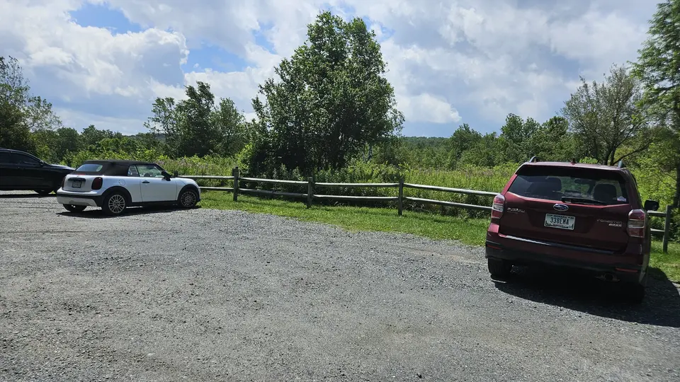The flat, gravel parking lot