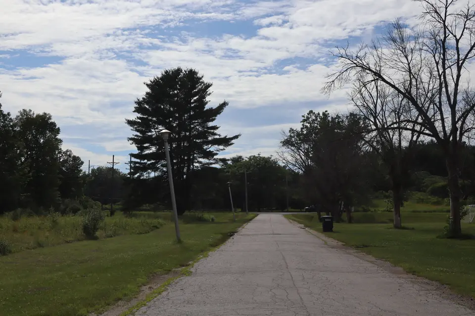 Run Way, a short paved road that leads from Pleasant Street to the parking area for the Lee Soccer Fields.