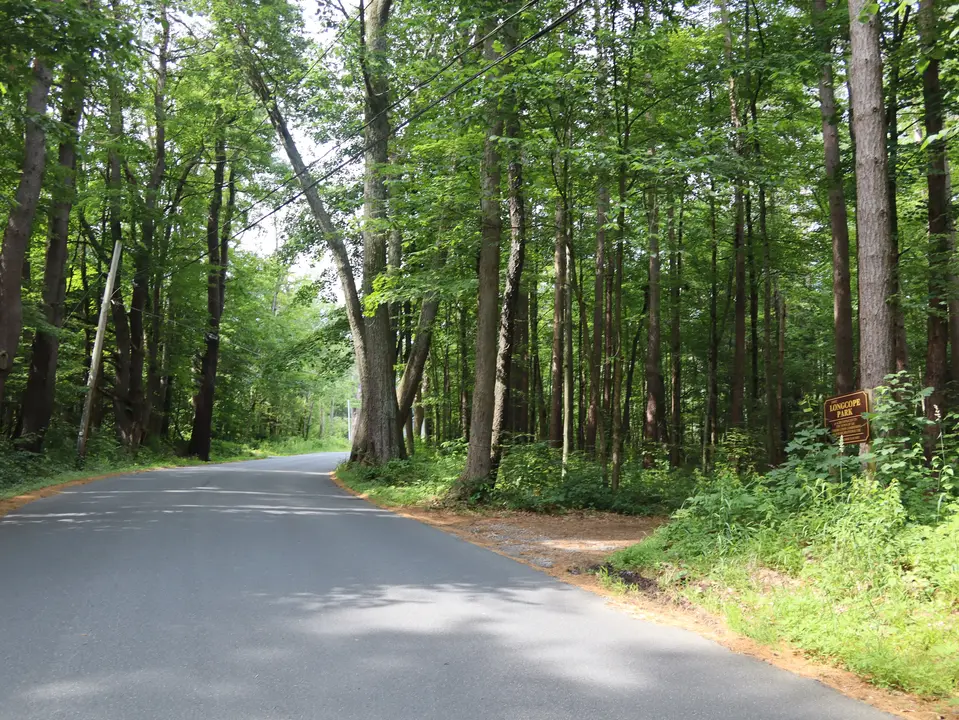 Entrance to the Longcope Property parking area (right) off Church Street.