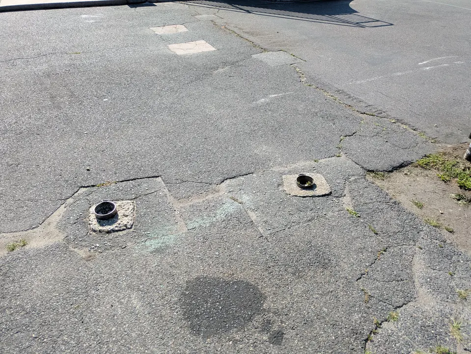 Bottom of old bollards located in the middle of the entrance