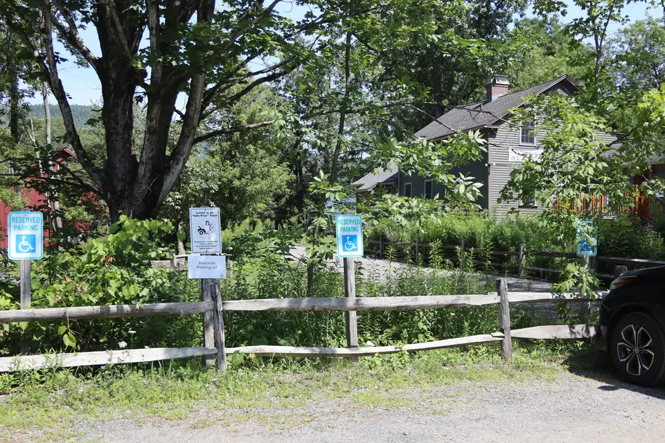 Three accessible parking spaces located adjacent to the Park Office and All Persons Trail.
