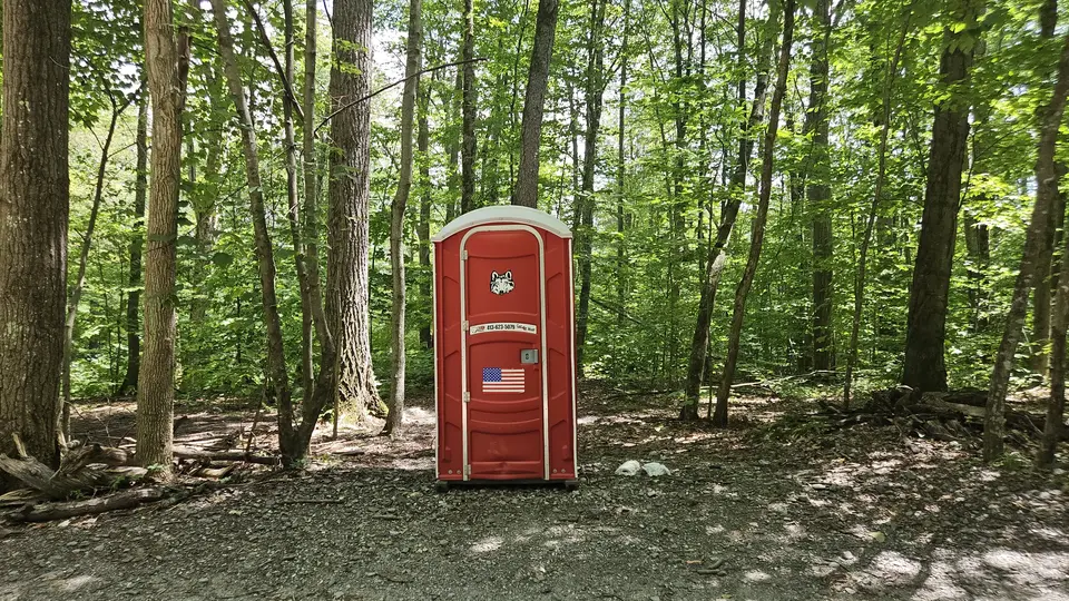 A non-accessible port-a-potty.