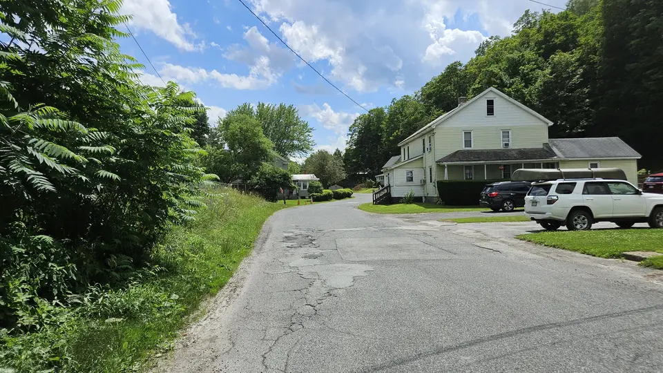 The drive that leads to the park.
