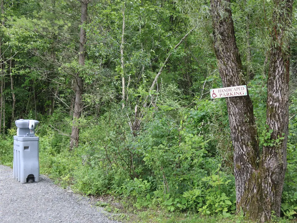 Entrance to the handicapped parking area, which sits at the bottom of a gravel road next to the beach.