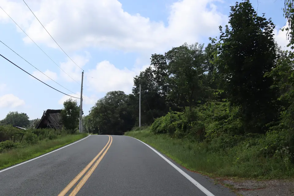 Entrance to the Shiffman Woods Reserve (right), off West Road.