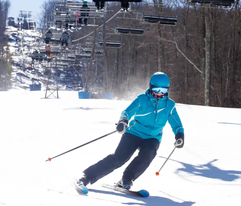 A skier descends down a trail at Ski Butternut.