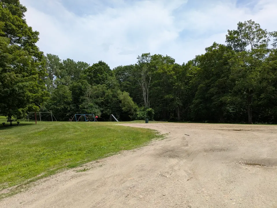 Entrance to the playground and the parking area