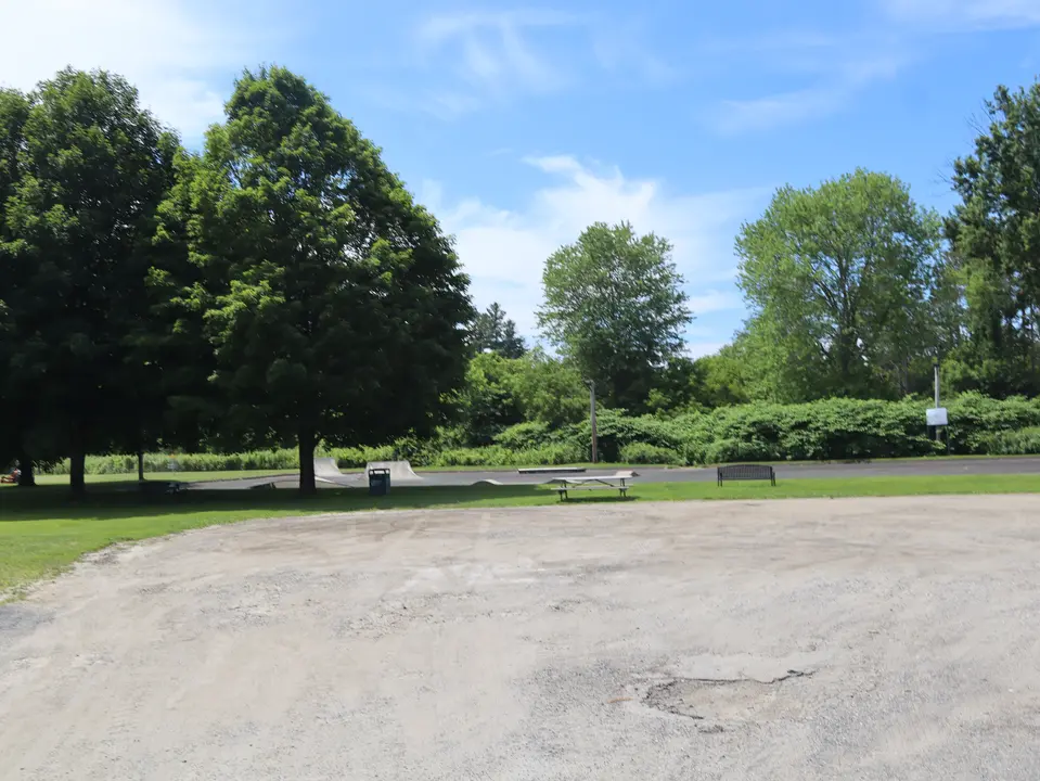 Stockbridge Town Park parking area, which provides room for at least six cars to park over dirt.