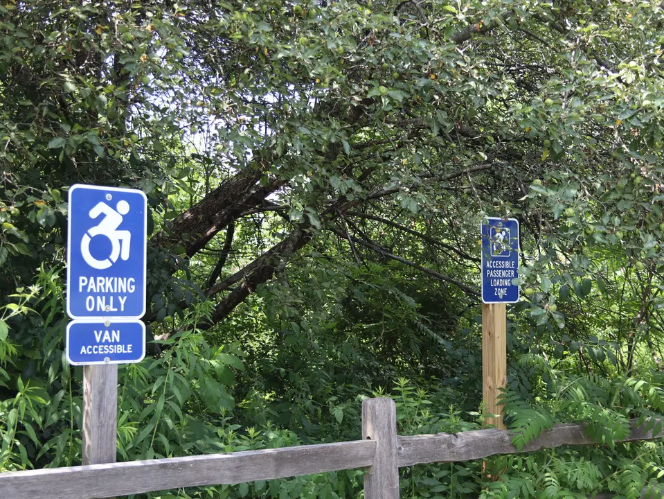 Two accessible parking spaces in the parking area at the Thomas & Palmer Brook Preserve.