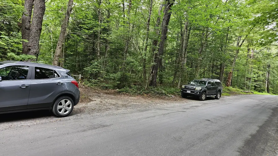 The pull-off parking area by the trailhead.